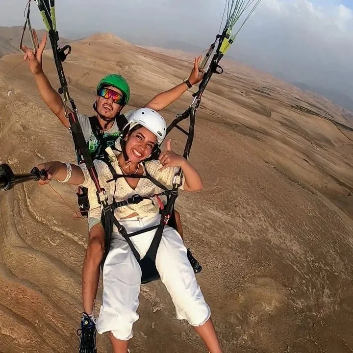 Passenger with open arms during the flight